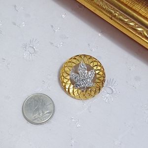 Vintage gold and rhinestone maple leaf brooch marked made in Canada